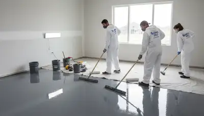 Epoxy floor coating in Norton MA garage by professional house painters for a durable, glossy finish