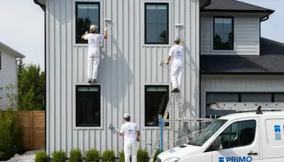 Professional siding painting on a Norton, MA home by expert local house painters